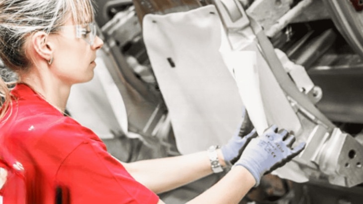 Automotive parts production worker